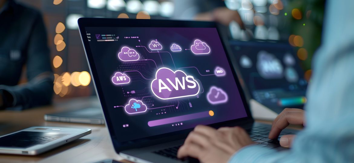 man working on a laptop with AWS web services holographic digital business hub device