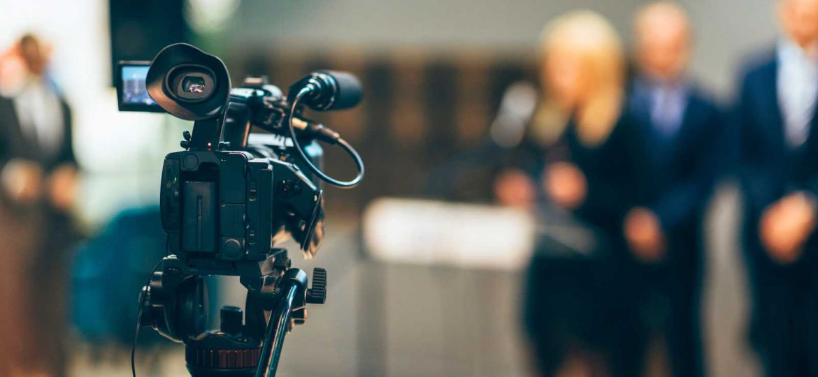 Media professionals being filmed